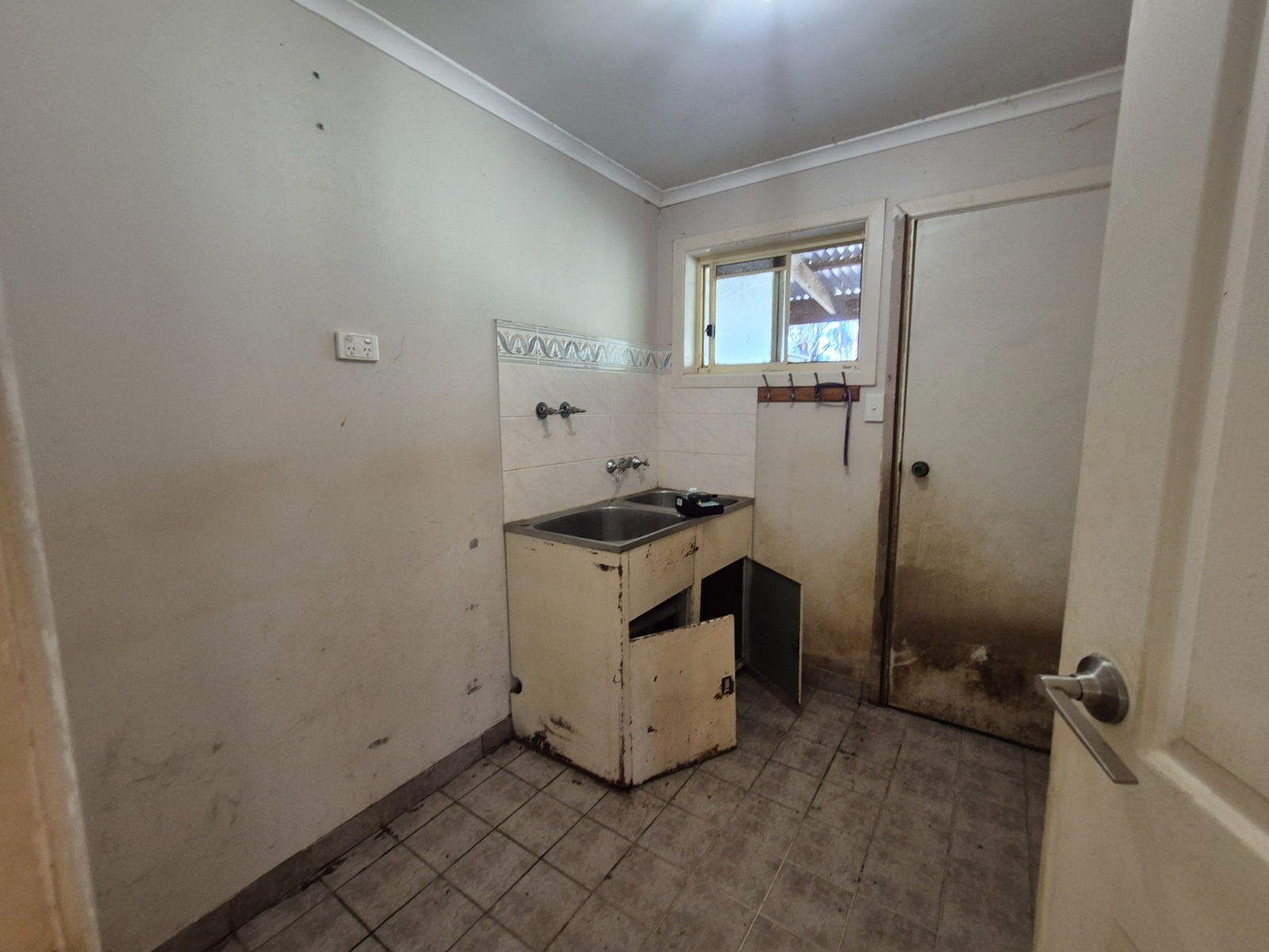 Extensive mould contamination across a ceiling, documented during an AIIZA field assessment